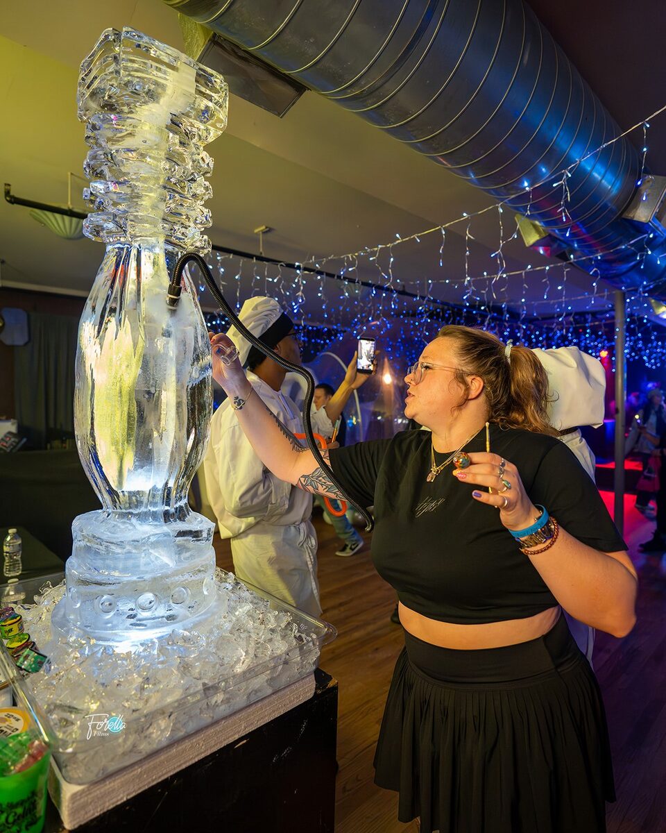 A guest at the ice luge bar