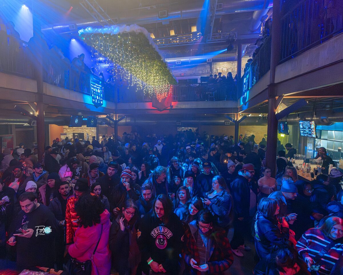 The floor packed to the balcony rail